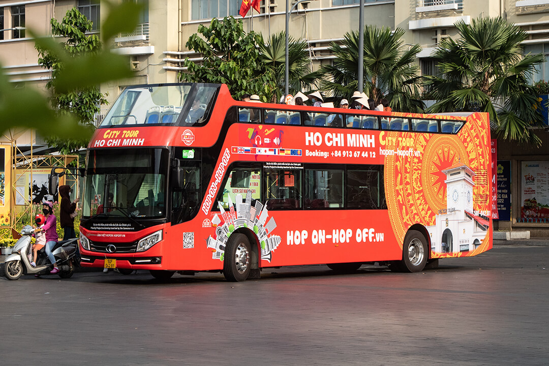 Open top bus HCMC - One in most things to do in Ho Chi Minh city