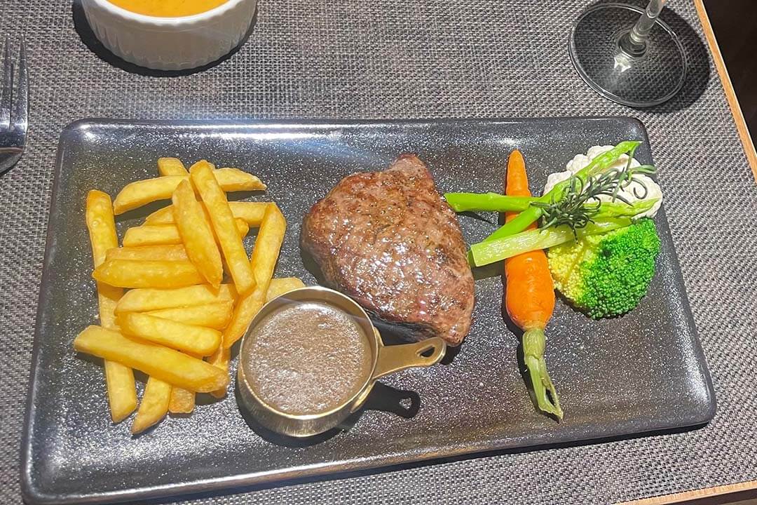 Steak at Chez Pierre Bistro Lounge