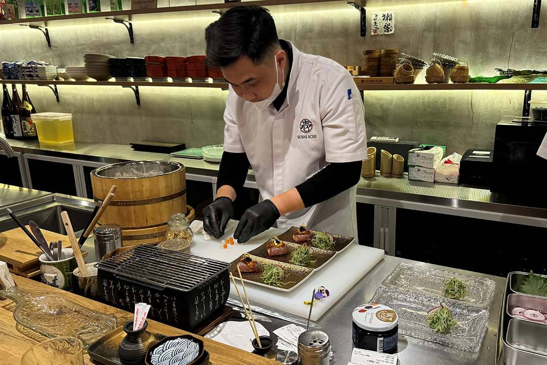 The Chef is preparing dishes at Ichi Sushi Restaurant