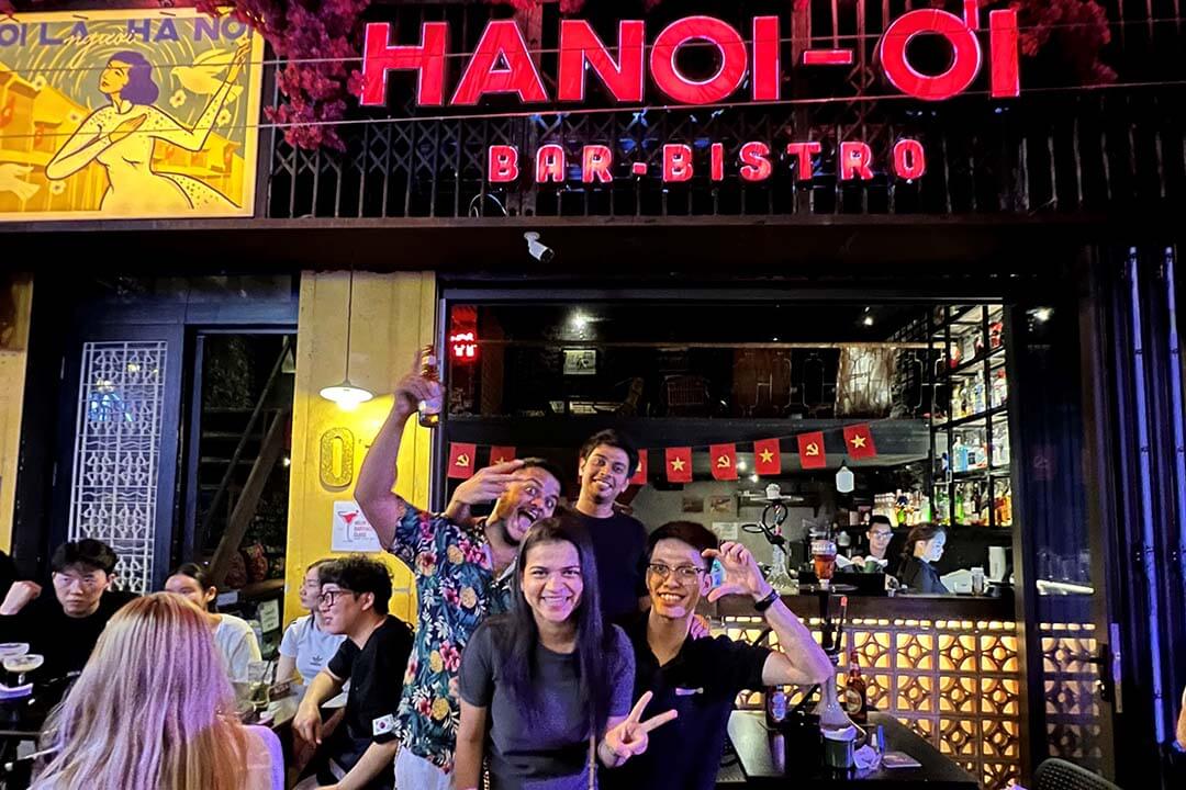 Tourists take souvenir photos at Hanoi oi Bar Bistro