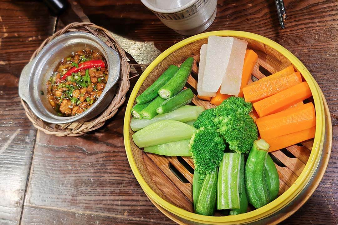 Vietnamese caramelized pork dip for vegetables in Bep Prime Restaurant